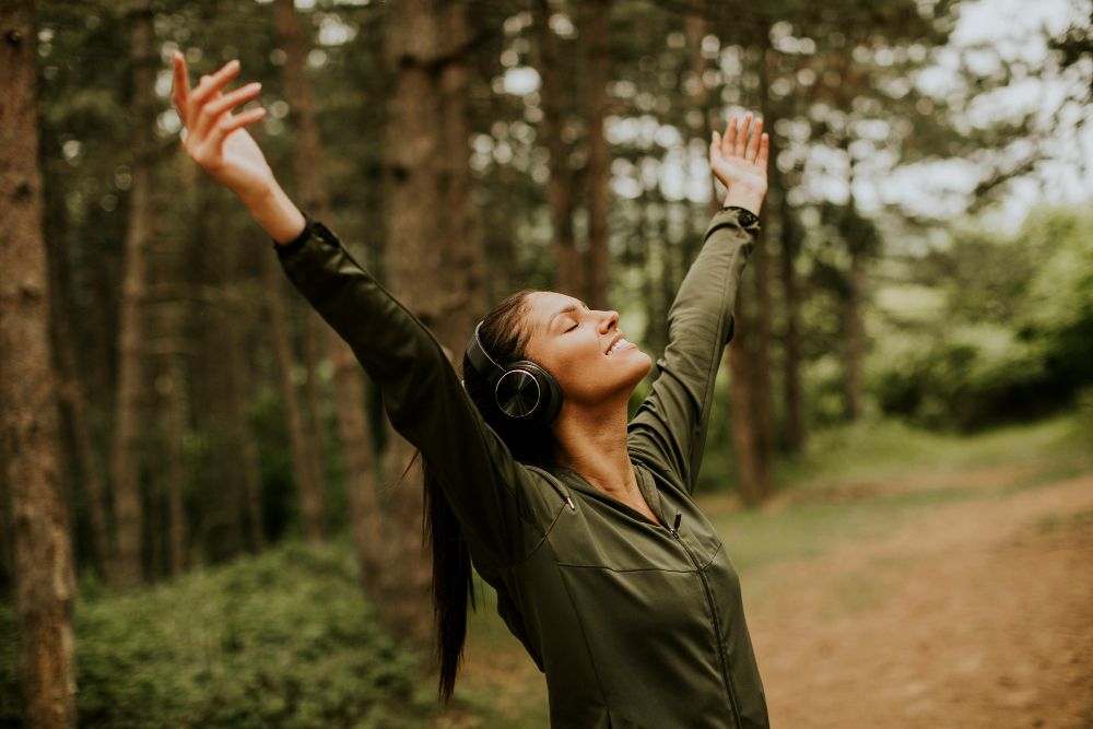 young woman enjoys training outside